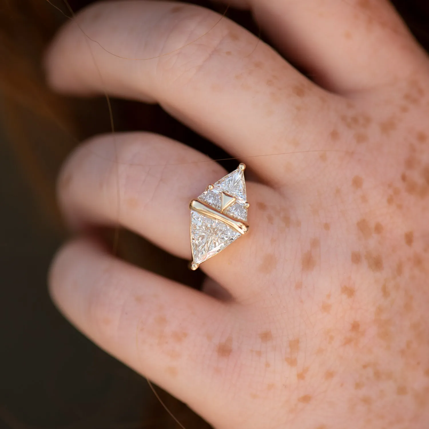 Pyramid Engagement Ring with Trillion and Trapeze Cut Diamonds