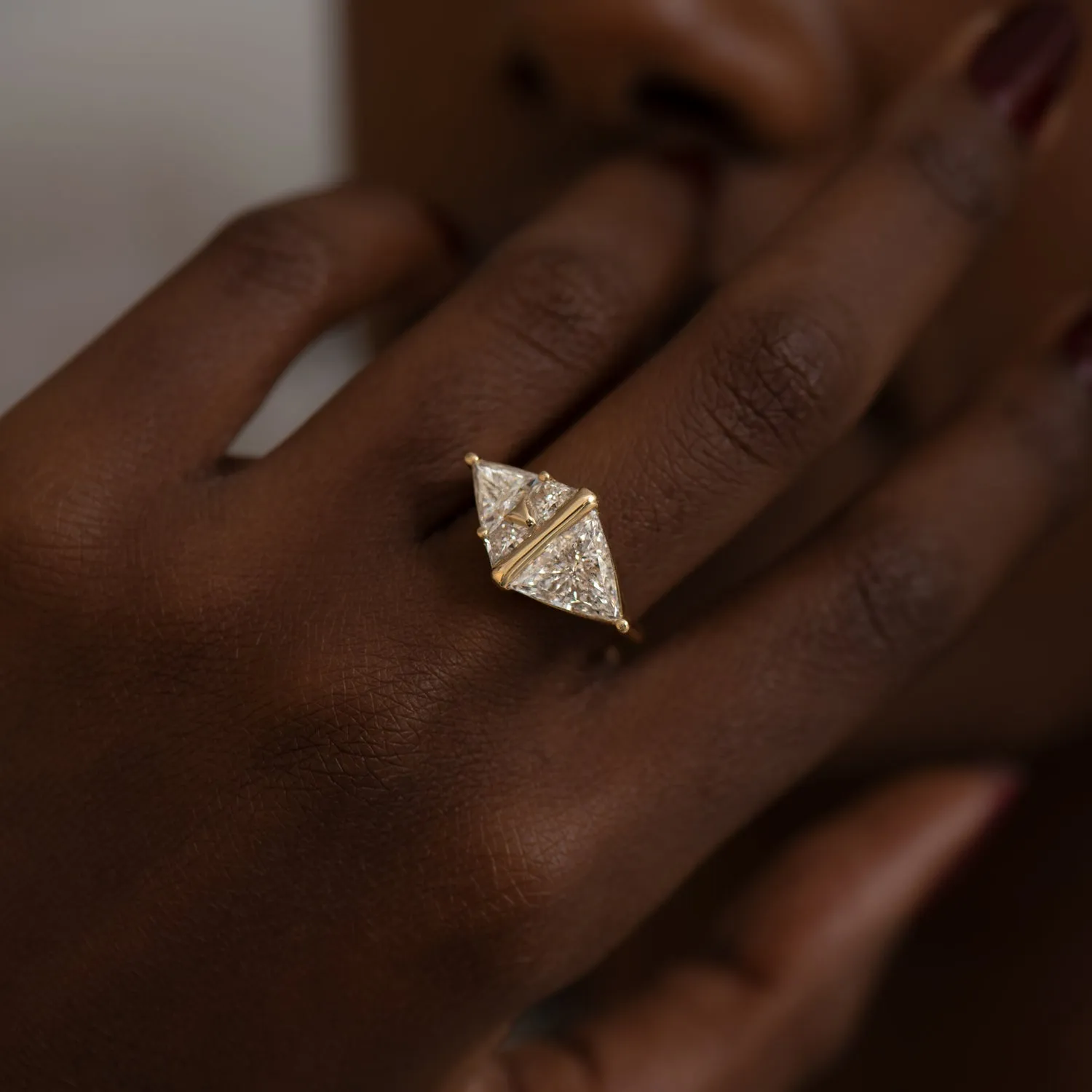 Pyramid Engagement Ring with Trillion and Trapeze Cut Diamonds