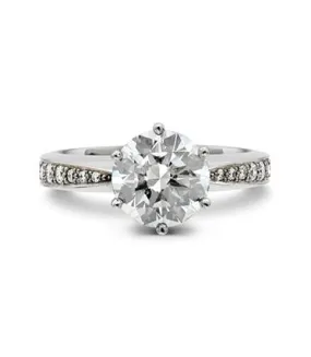 Tapering bead set engagement ring